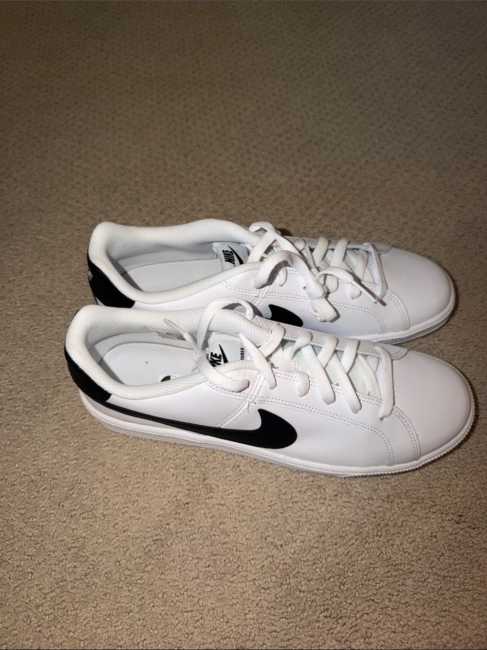 Nike White Leather Sneakers with Black Swoosh